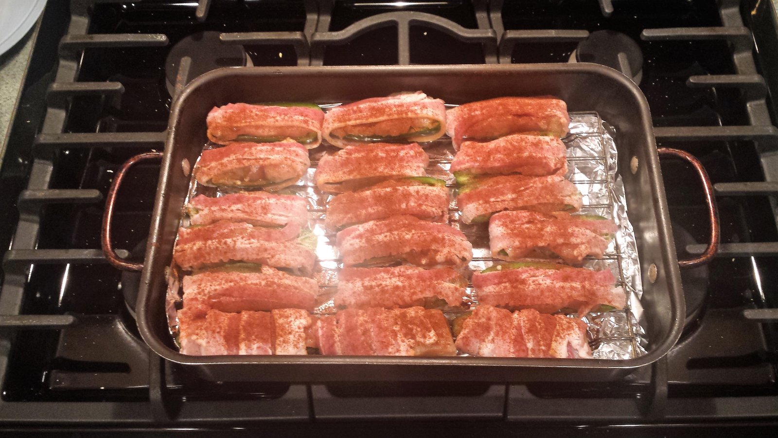 Here are the Armadillo Eggs ready for the oven.
