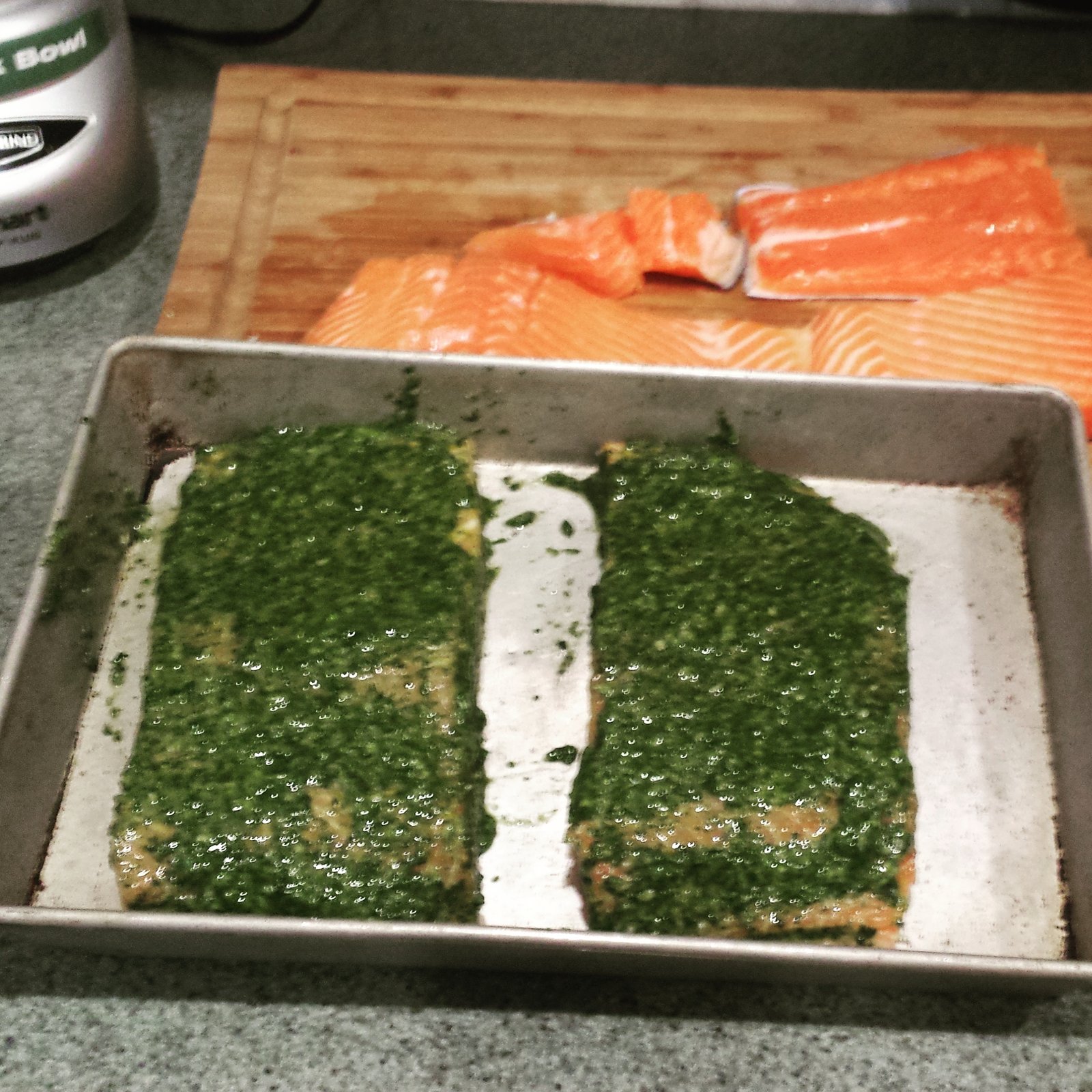 Salmon coated with basil and mint pesto