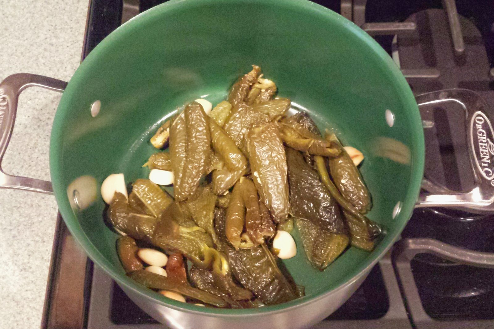 Peppers and garlic in pot