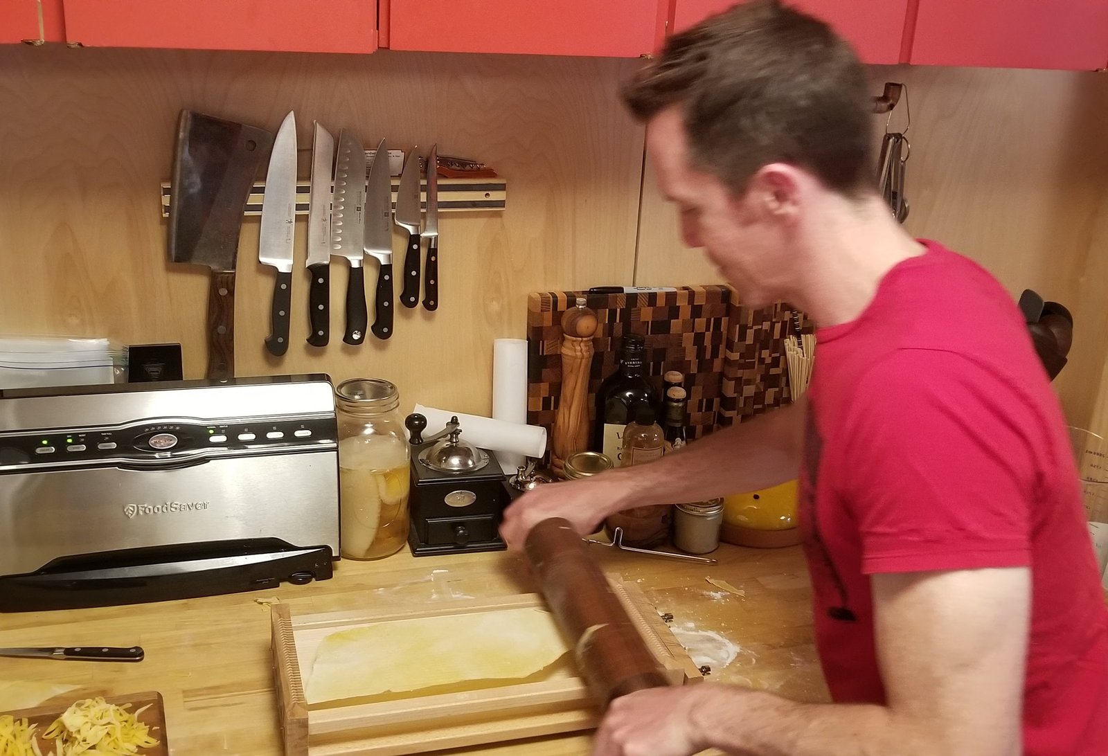 Here we are using the chitarra to cut the pasta.