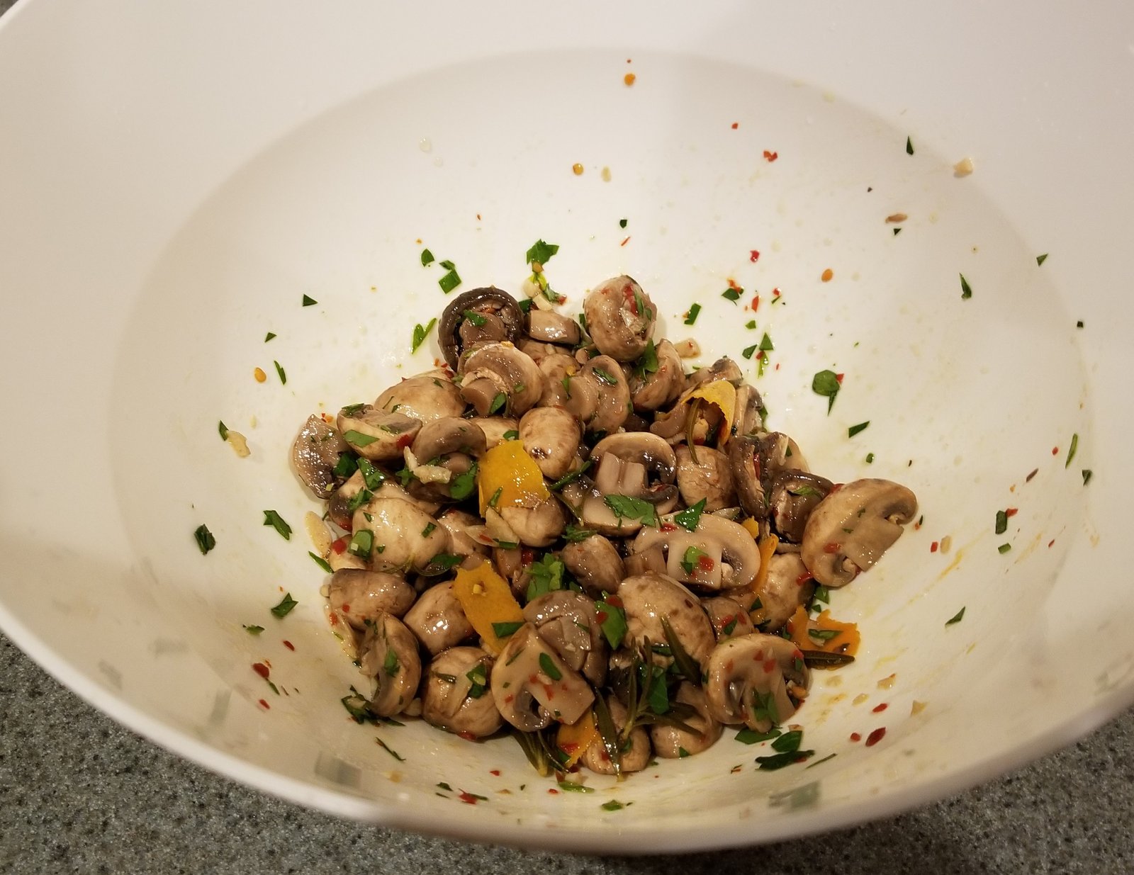 Here are our mushrooms after we drizzled with olive oil and sprinkled with parsley. They were eaten too fast so I couldn't get a picture of them in a nice clean serving bowl.