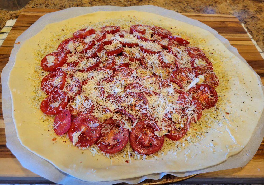 Add red pepper flakes, salt, pepper, Italian Seasoning, and Parmesan cheese.