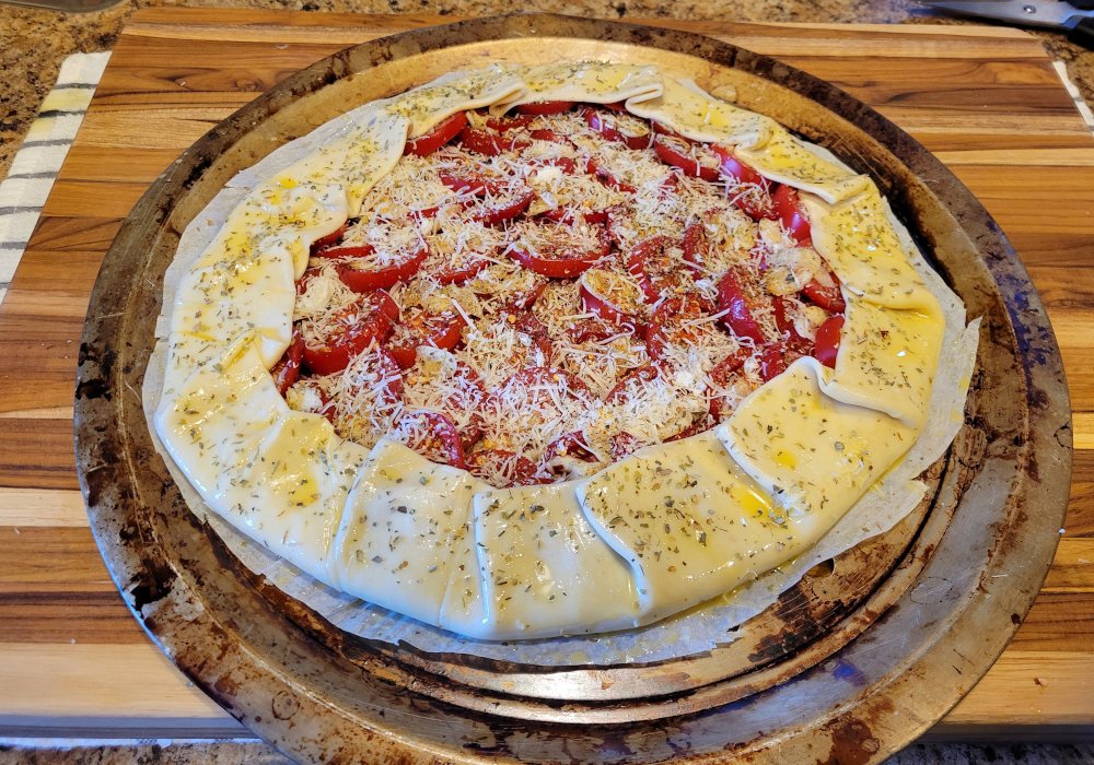 Trim the parchment paper to the size of the galette.