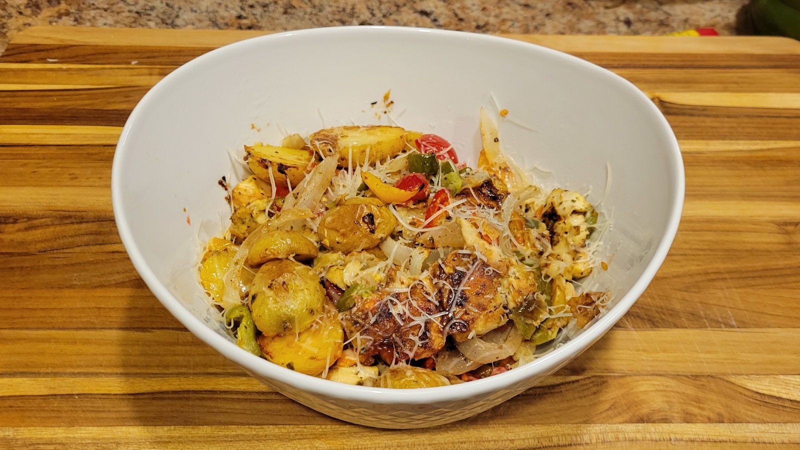 A picture of a bowl of Spicy Italian Chicken and Potatoes ready to eat.